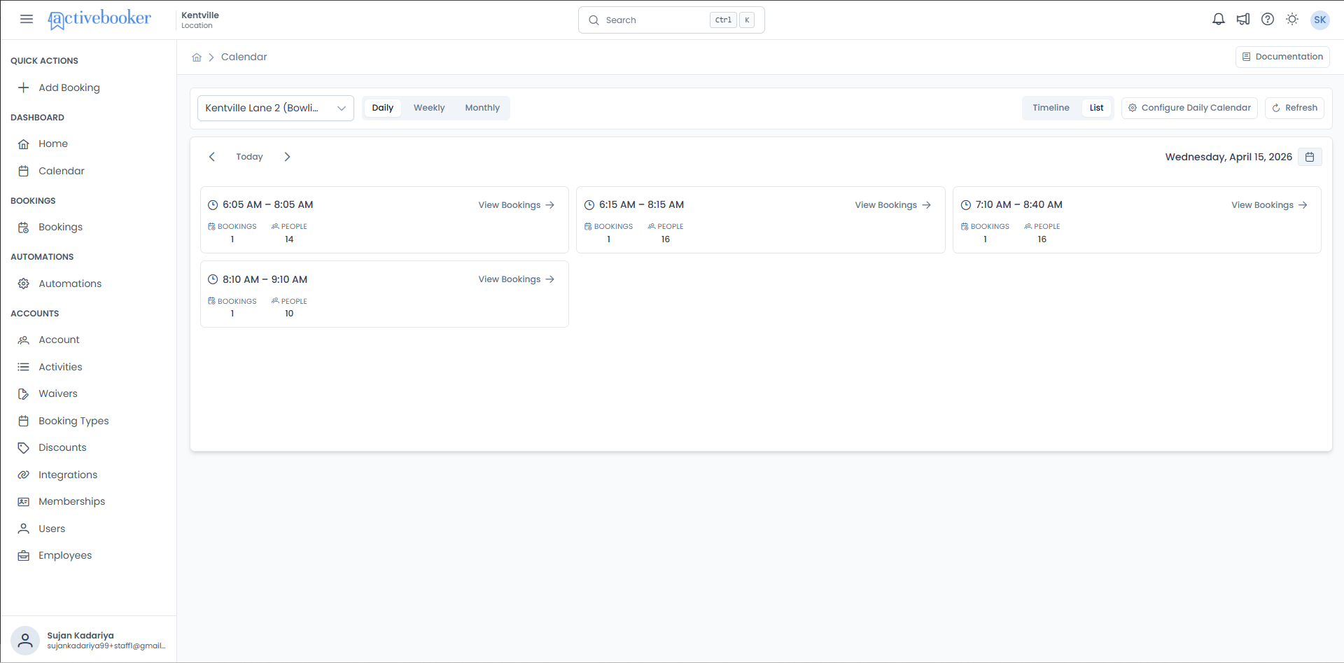 Daily list view showing grouped booking cards with time range, booking count, and people count